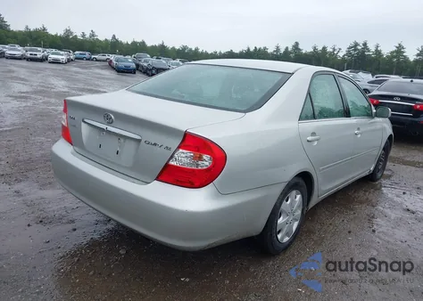 2002 Toyota Camry Xle z USA, uszkodzony, nr VIN 4T1BE30K92U612119